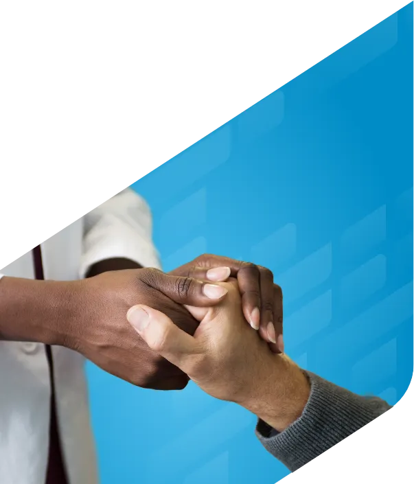 Close up shot of patient and doctor’s pair of hands holding one another